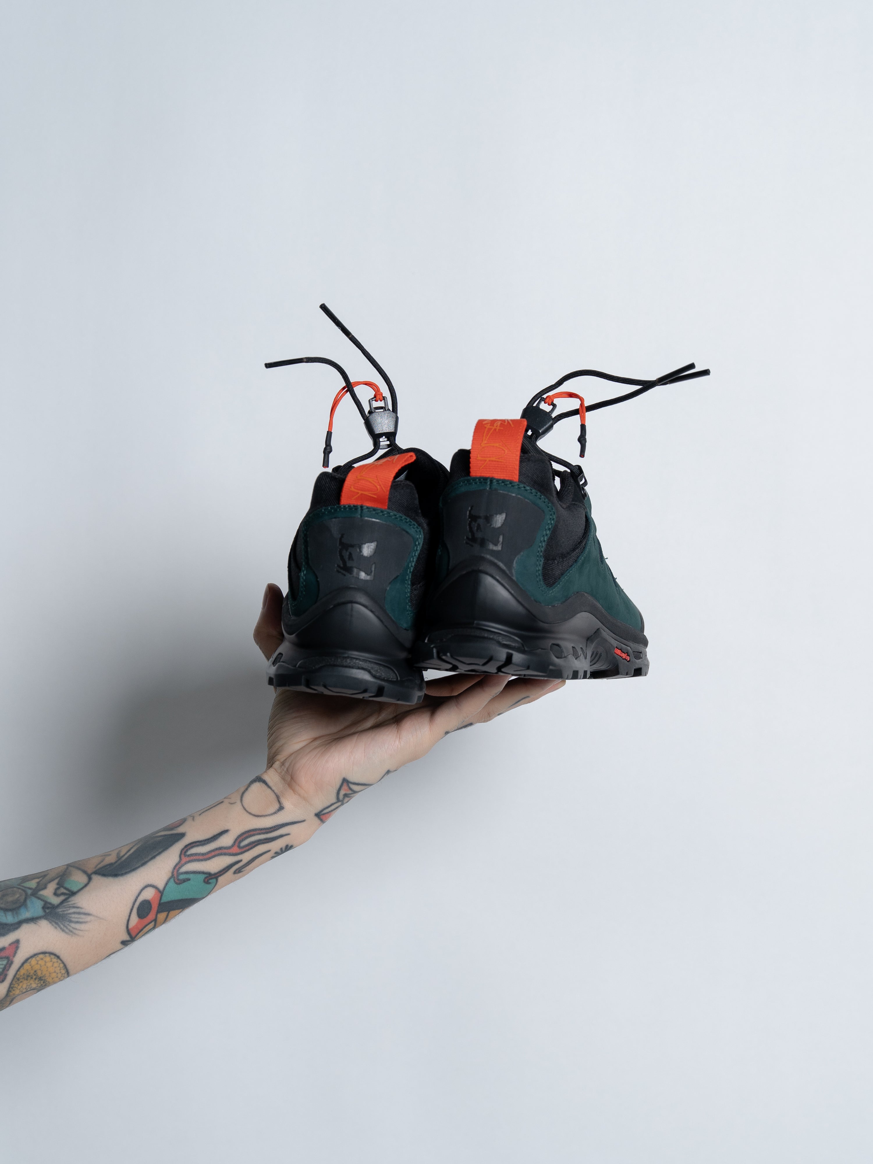 GR10K x Salomon Quest Low 2 (Black/ Ponderosa Pine/ Scarlet)