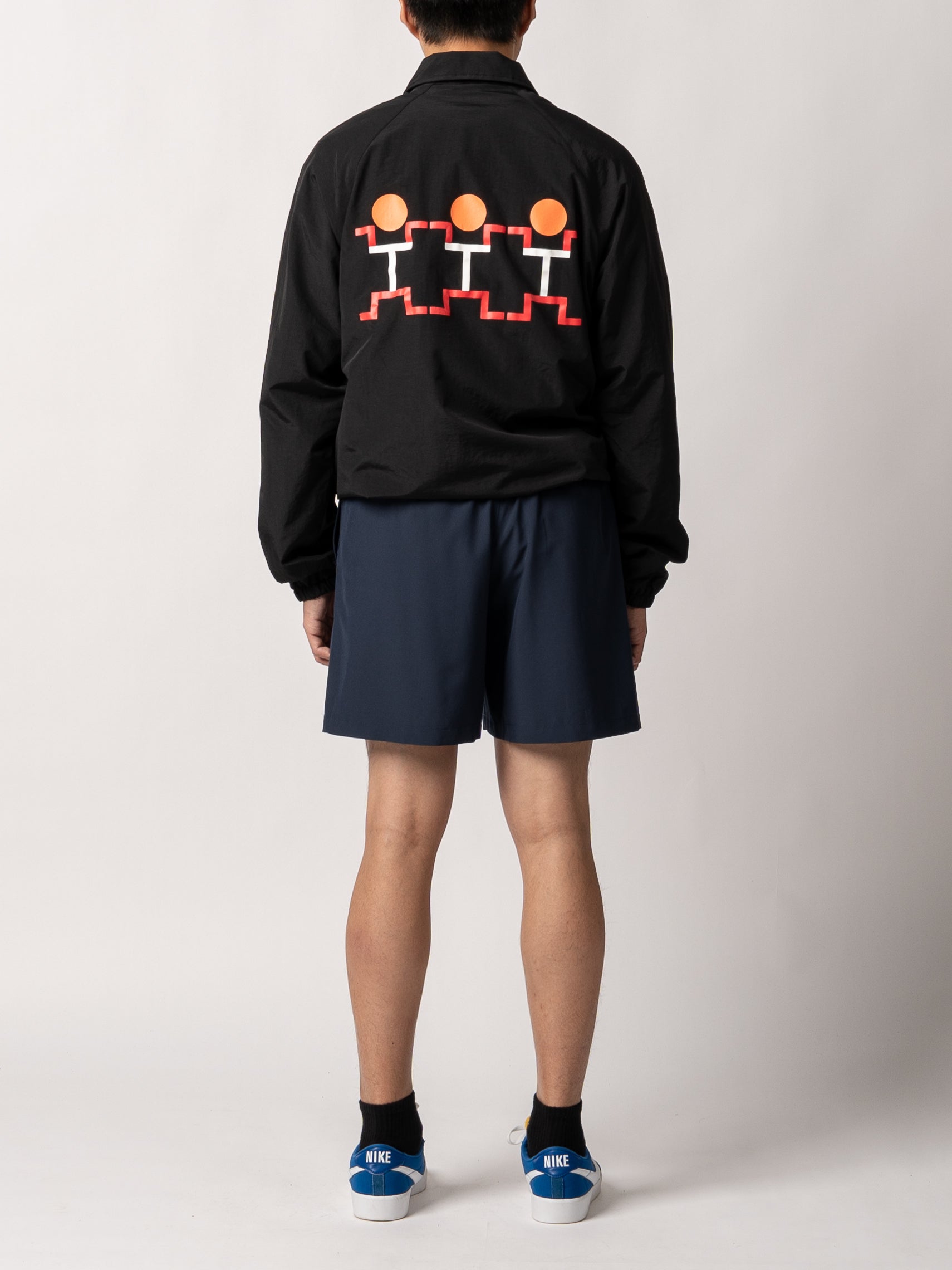 The Trilogy Tapes Three People Coach Jacket (Black)