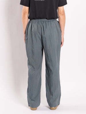 
                
                    Load image into Gallery viewer, CONICHIWA bonjour Nylon Track Pants (Airforce)
                
            