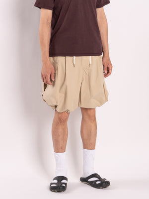 
                
                    Load image into Gallery viewer, CONICHIWA bonjour Wide Cargo Shorts (Beige)
                
            