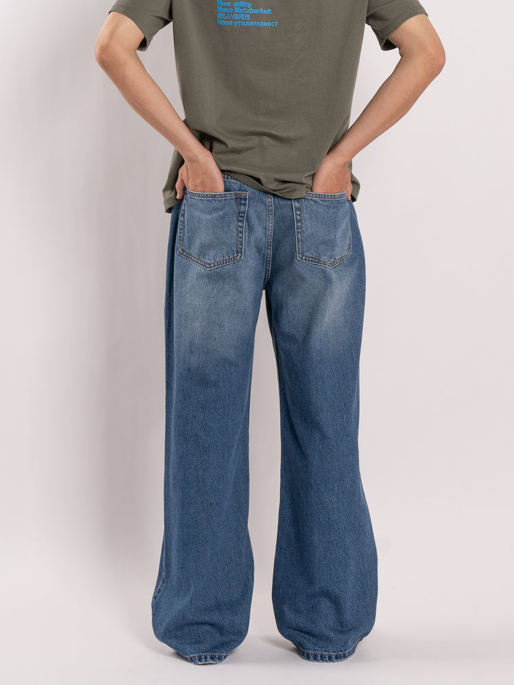 
                
                    Load image into Gallery viewer, CODA Indigo Washed Distressed Break Cut Flared Jeans (Indigo)
                
            