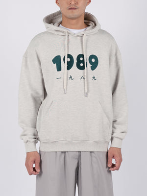 
                
                    Load image into Gallery viewer, CONICHIWA bonjour 1989 Hoodie (Oatmeal)
                
            